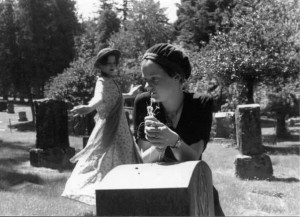 Adria dancing & Parrrish w-flowers in cemetery